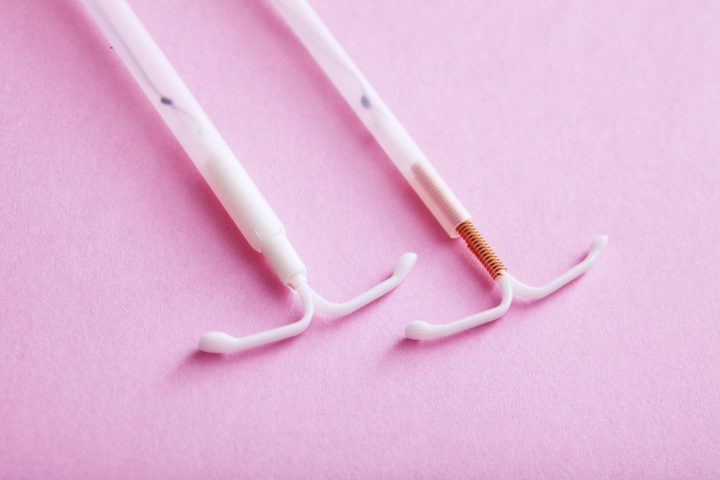 two pink IUDs on a pink background