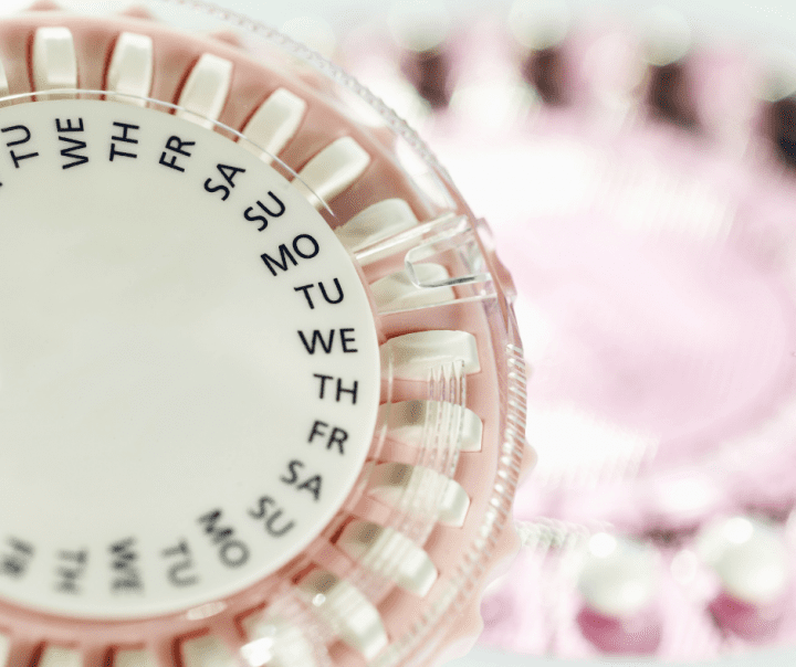 Birth control pills in a circular case